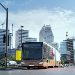 Contemporary cityscape of Casablanca with a modern bus navigating through the urban environment.